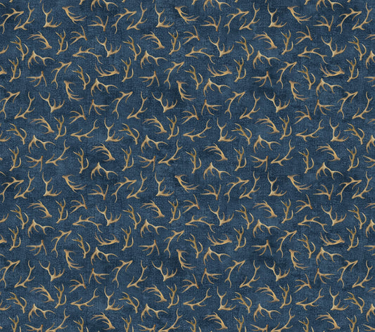 Intricately designed antlers quilt showcasing expert quilting craftsmanship and detailed stitching patterns